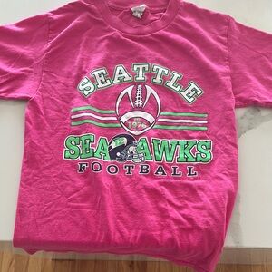 Wilson Seattle SEAHAWKS Football pink T-shirt size small 100% cotton